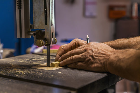 Knife maker in workshop at work