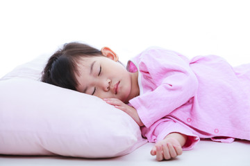Obraz na płótnie Canvas Healthy children concept. Close up of asian girl sleeping peacefully. Isolated on white background.