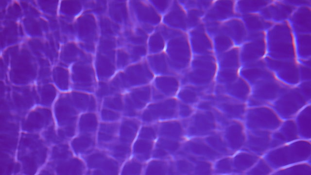 caustics below the water surface in full HD with purple filter effect