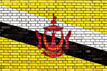 flag of Brunei painted on brick wall