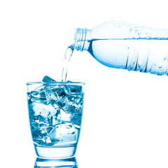 Pouring water into a glass