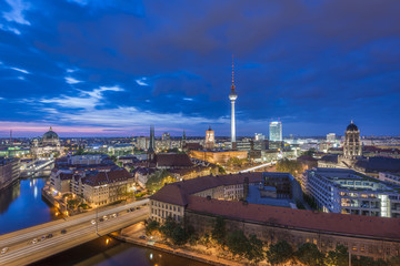 View over Berlin Skyline (TV Tower, Alexanderplatz, Town Hall, River Spree and Berlin Cathedral) at evening after sunset, Germany, Europe