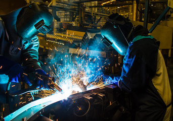 welding worker in the automotive part in Industrial
