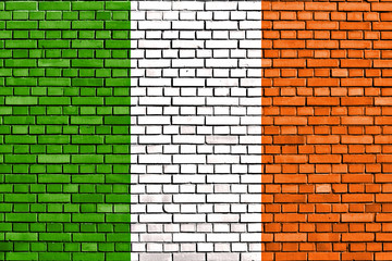 flag of Ireland painted on brick wall