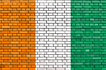 flag of Ivory Coast painted on brick wall