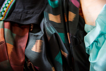 Colorful silk scarfs in a market.