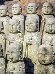 Fototapeta na wymiar Little monk buddha statues