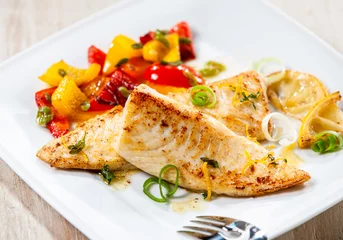 Rolgordijnen Close up of fresh tilapia fish fillet © exclusive-design