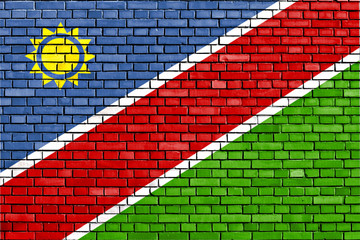 flag of Namibia painted on brick wall