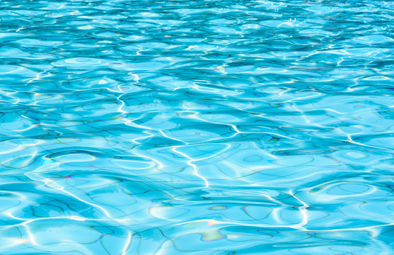 Background of rippled water in swimming pool / Blue ripped water in swimming pool (swimming, pool, wave)