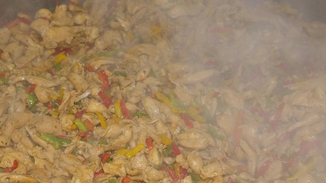Marinating 20kg of chicken filet in a professional Restaurant kitchen