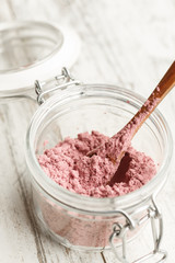 Acai powder in a glass jar