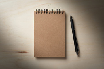Notepad on wood table