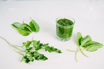 Green vegetable juice organic from natural at on white table