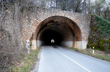 Fototapeta na wymiar old stone built road tunnel
