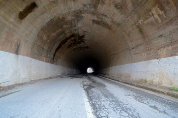 Fototapeta na wymiar old stone built road tunnel