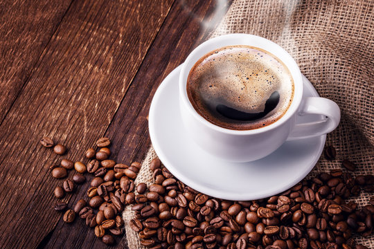 Cup coffee beans wooden