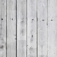 white painted pine planks on fence in square format