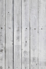 white painted pine planks on fence in square format