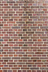 Fototapeta premium dunkle Backstein Wand Textur