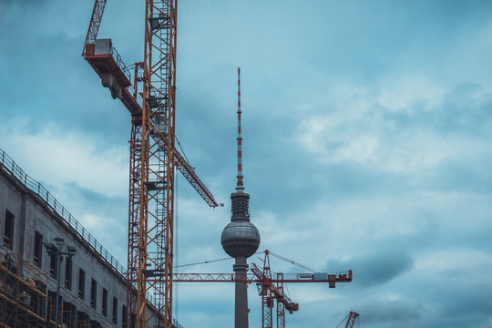 Construction Cranes in front of Berling TV Tower