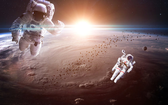 Astronaut in outer space. Spacewalk. Elements of this image furnished by NASA - Powered by Adobe