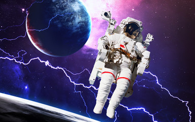 Astronaut in outer space. Spacewalk. Elements of this image furnished by NASA