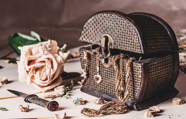 jewelry box, dried rose and old subjects