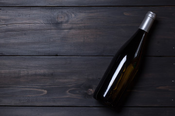 White wine on dark wood