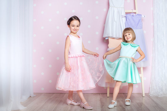 little girls dressed in princess