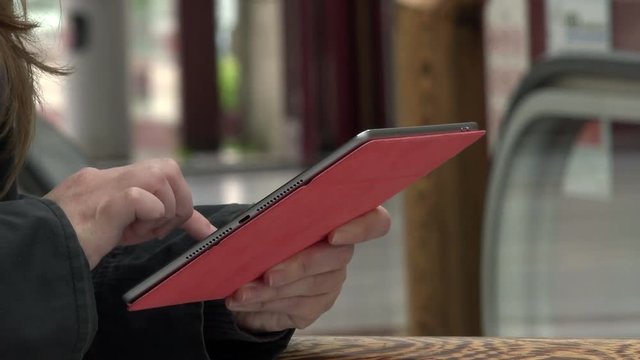 Young Caucasian Woman Using Ipad Tablet Computer
