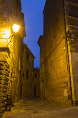 Fototapeta na wymiar Deserted streets in the medieval town of Montepulciano at night, Tuscany, Italy
