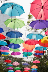 Fototapeta na wymiar colorful umbrella hanging on the rope