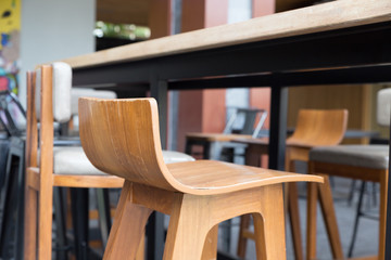 brown wooden table with stool