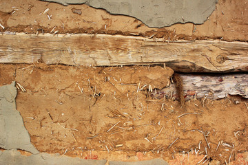 Old wooden and earthen wall - obrazy, fototapety, plakaty