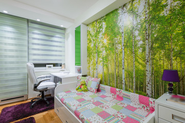 Children's room with wallpaper mural photo