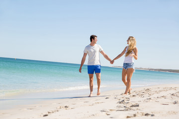 Romantic young couple on the beach