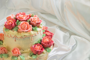 cream cake with roses closeup