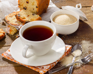 Cup of tea with sweet cake, ginger