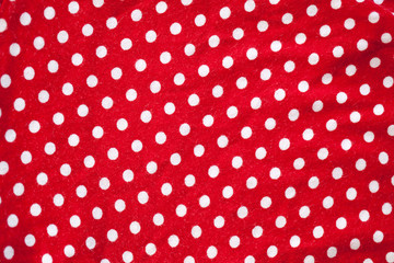 Polka dot on red canvas cotton texture