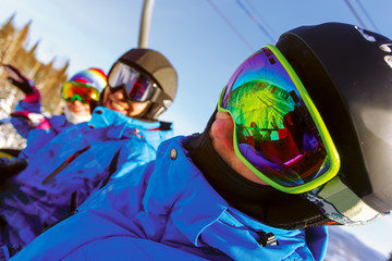 Group cheerful snowboarders