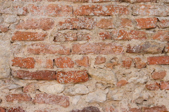 Old brick wall in a background image for designer