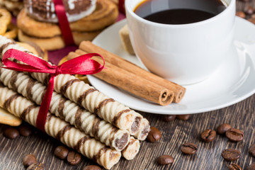 Biscuits and coffee on table