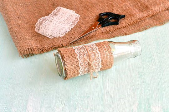 Glass bottle, scissors, burlap, lace. Set for handmade vase
