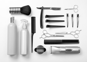 Barber set with tools, equipment and cosmetics, isolated on white