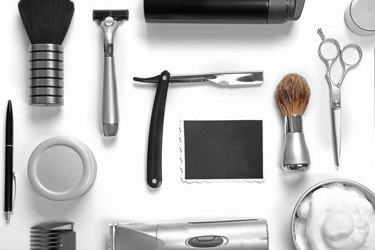 Black photo, shaving set with equipment, tools and foam, isolated on white