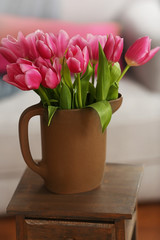 Bouquet of pink tulips in a vase, close up