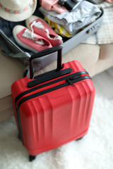 Large red polycarbonate suitcase, close up
