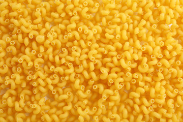 Italian dry pasta background, close up
