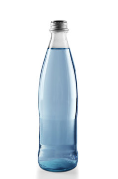 Glass bottled water on the grey background, close up